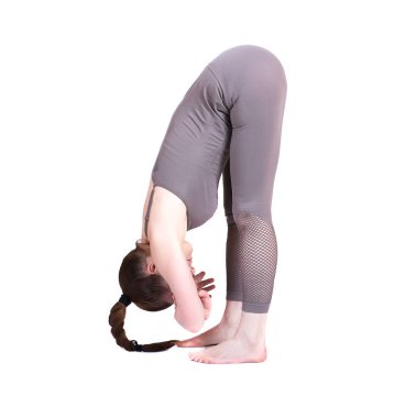 Genç kız Yoga, esnek güzel model beyaz bir arka plan üzerinde farklı pozlar gerçekleştirir. meditasyon ve asanas.