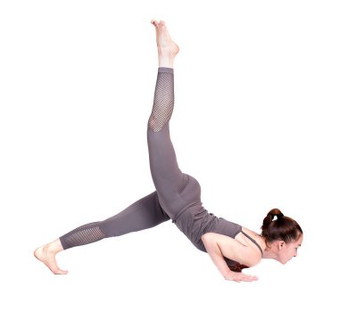 Genç kız Yoga, esnek güzel model beyaz bir arka plan üzerinde farklı pozlar gerçekleştirir. meditasyon ve asanas.