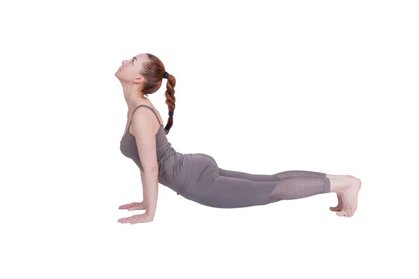 Jong meisje voert verschillende poses van yoga, flexibele mooie model op een witte achtergrond. meditatie en asana 's. — Stockfoto