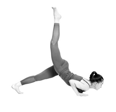 Genç kız Yoga, esnek güzel model beyaz bir arka plan üzerinde farklı pozlar gerçekleştirir. meditasyon ve asanas.