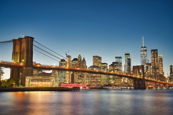 Photo of the Brooklyn Bridge from DUMBO at the sunset tine