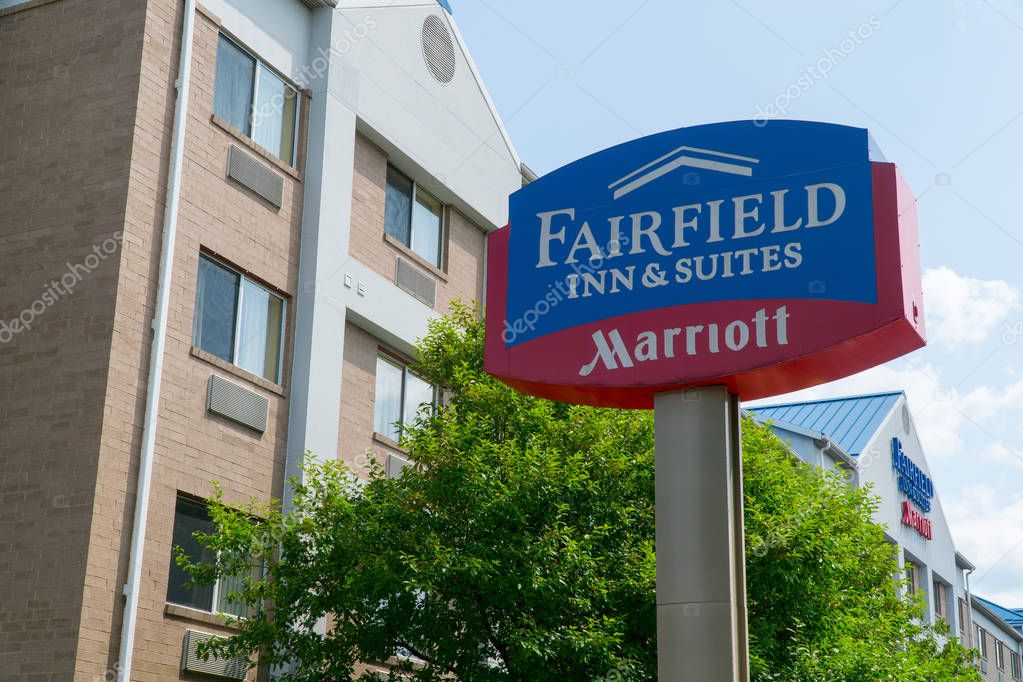 New York, USA - Circa 2018: Fairfield Inn & Suites Marriott hotel chain exterior building and sign. People travel and book room to sleep at night
