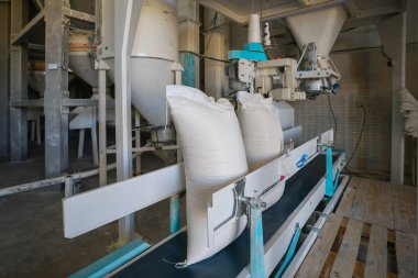 Flour bags in a mill stock image. High quality photo