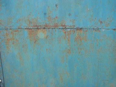 Paslı metal oluklu metal arka plan. Paslı meta. Eski metal levha çatı dokusu