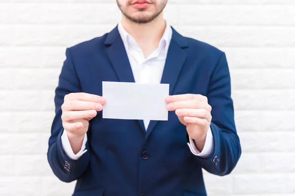 Business Man Showing White Paper Man Wearing Blue Suit Holding — Stock Photo, Image