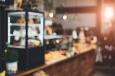 Ekmek pasta ve kahve dükkanı bulanık arka plan. Gıda ve restoran kavramı. Co çalışma Tema.