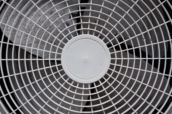 Close up of white air conditioner grille. Electronics industry and Material concept. Background and texture theme.