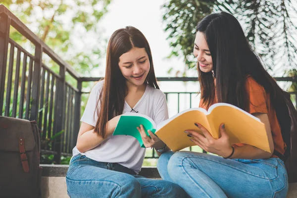 Two Asian Beauty Girls Reading Tutoring Books Final Examination Together — Stock Photo, Image