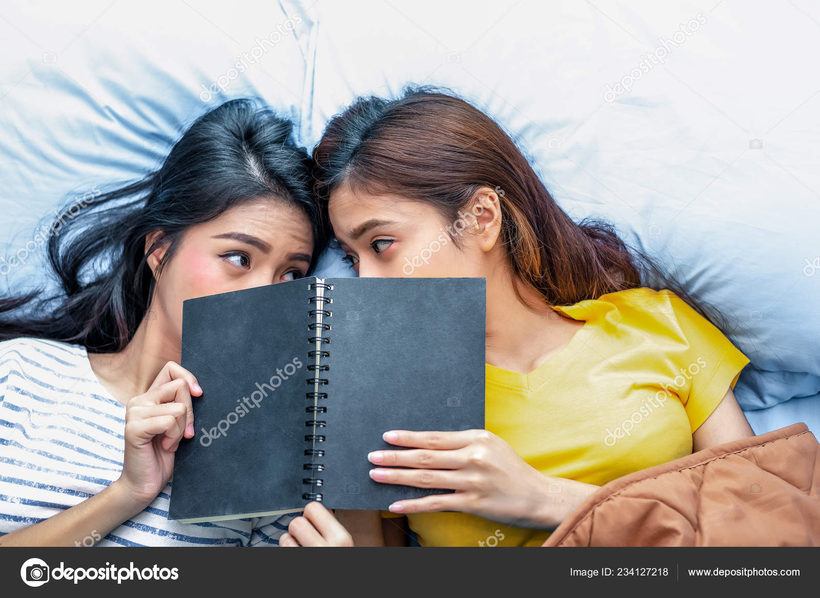 Asian Lesbian Lovers Videos - Cute Asian Lesbian Couple Reading Book Together Lying Bed ...