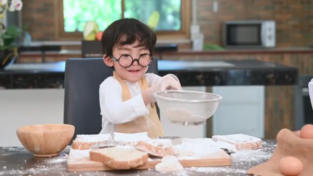 Cute Little Asian Boy Sifting Dough Flour Sifter Sieve Colander — Stock Video