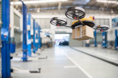 Önde gelen otomotiyer garaj deposunda yedek parça teslimat drone