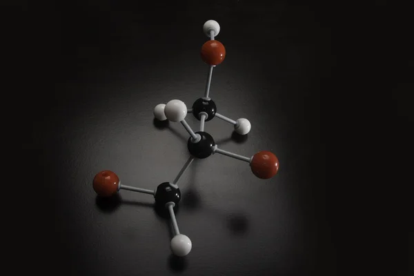 赤黒と白のボールを表す化学モデル — ストック写真