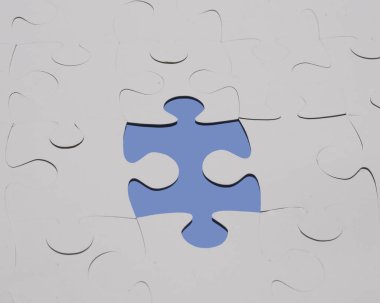 Gri bir renk kısmı jigsaw karton şekiller.