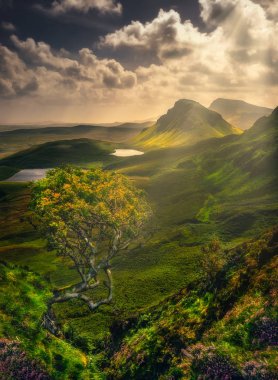 Scenic landscape view of Quiraing mountains in Isle of Skye, Scottish highlands, United Kingdom clipart