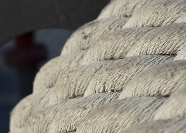 Close-up of old frayed boat rope as a background in war ship