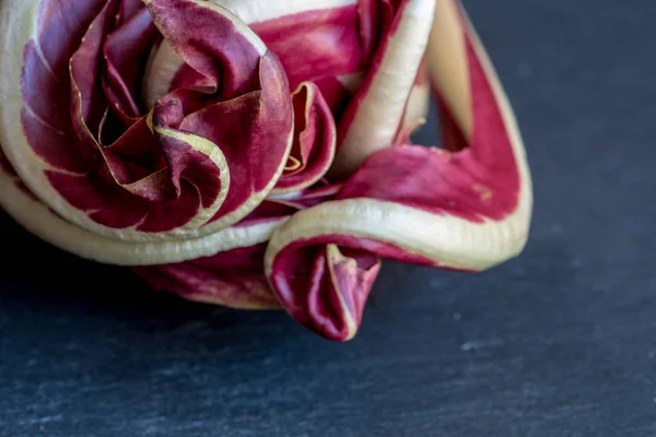 foreground of the tips of the leaves of a Treviso radicchio, vegan and healthy food
