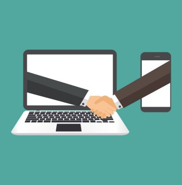 İş adamları cep telefonuyla bilgisayar ekranından el sıkışıyor