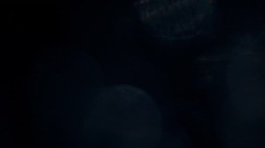 Golden bokeh lights light leak lens flare luxurious abstract overlay transition