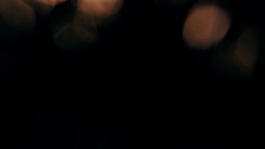 Golden bokeh lights light leak lens flare luxurious abstract overlay transition