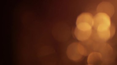 Golden bokeh lights light leak lens flare luxurious abstract overlay transition