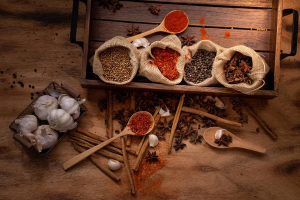 Top view set of spices and herbs on wooden tray,Food and cuisine ingredients.