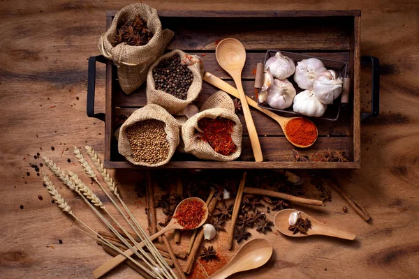 Top view set of spices and herbs on wooden tray,Food and cuisine ingredients.