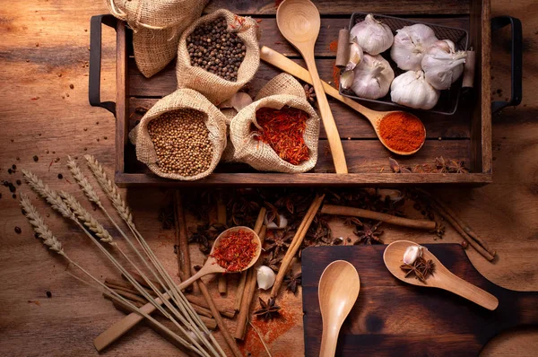 Top view set of spices and herbs on wooden tray,Food and cuisine ingredients.