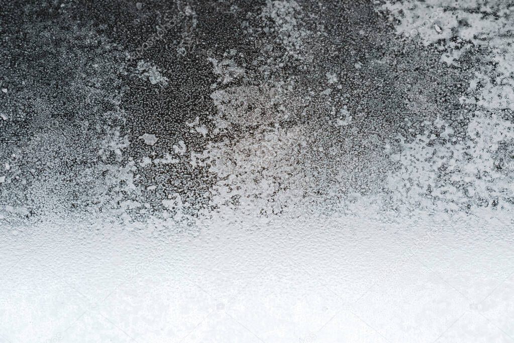 Abstract texture, grungy, gritty, dirty background. Texture captured by focusing closely on a dirty old window, using a macro lens.