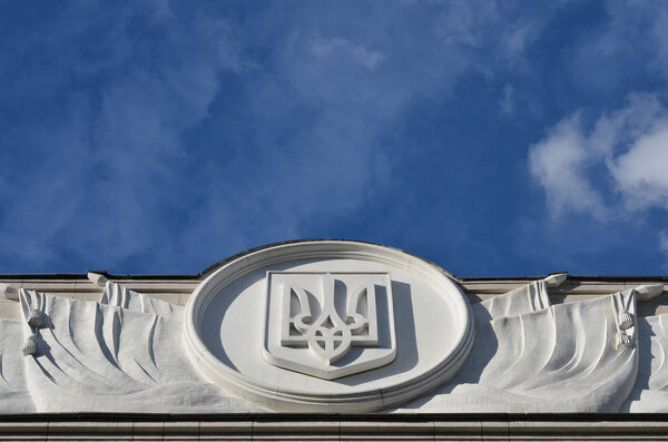 Coat of arm of Ukraine on facade Parliament of Ukraine