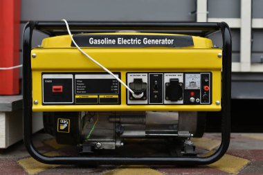 yellow gasoline electric generator