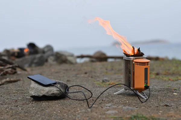 camp stove charges the phone