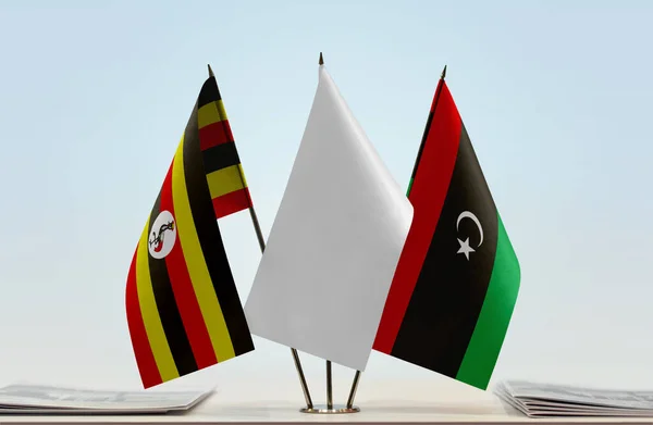 Uganda Libyen Och Vit Flagga Monter Med Papper — Stockfoto