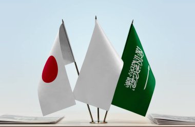Japonya, Suudi Arabistan ve beyaz bayraklar masada gazeteler