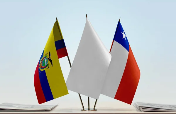 Ecuador, Chile and white flags on stand with papers