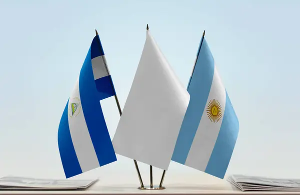 Argentina Nikaragua Vlajky Stojanu Papíry — Stock fotografie