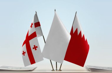 Gürcistan, Bahreyn ve beyaz bayraklar masada gazeteler