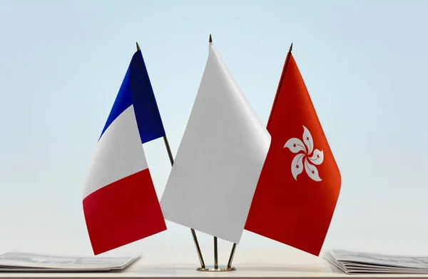 stock image  and white flags on stand with papers  