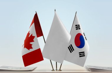 Kanada Güney Kore belgelerle bayrak salladı
