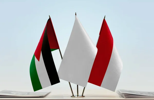 Флаги Иордании Монако Стенде Бумагами — стоковое фото