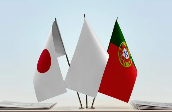 Portugal Japan Vlaggen Stand Met Papieren — Stockfoto