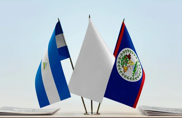 Banderas Belice Nicaragua Stand Con Papeles — Foto de Stock