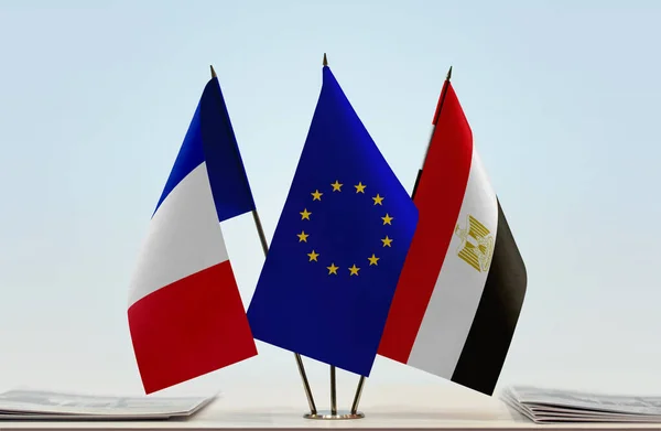 France Egypt and eu flag on stand with papers