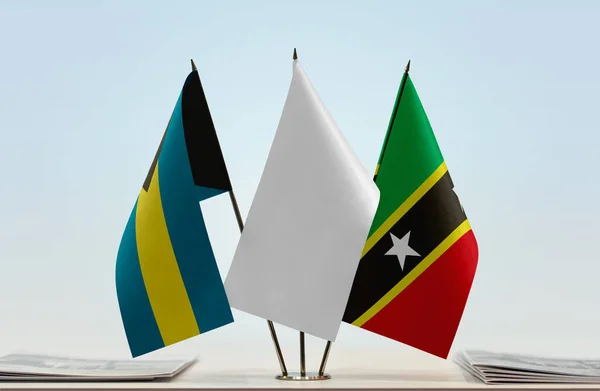 Bahama Saint Kitts Nevis Witte Vlaggen Standaard Met Papieren — Stockfoto