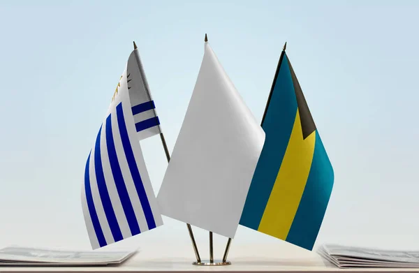 Bahamas Uruguay Flags Stand Papers — Stock Photo, Image