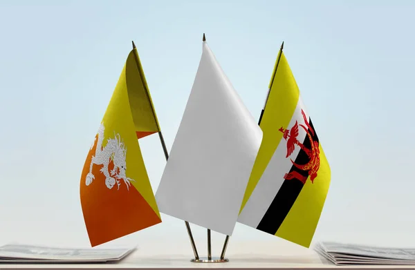 Bhutan Brunei Flags Stand Papers — Stock Photo, Image