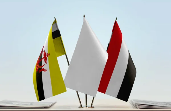 Brunei Yemen Flags Stand Papers — Stock Photo, Image