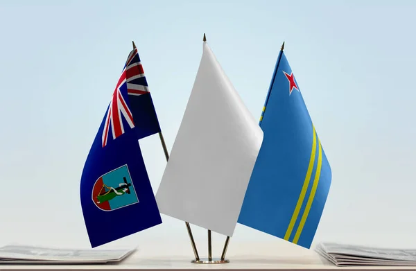 Montserrat Aruba Banderas Stand Con Papeles — Foto de Stock