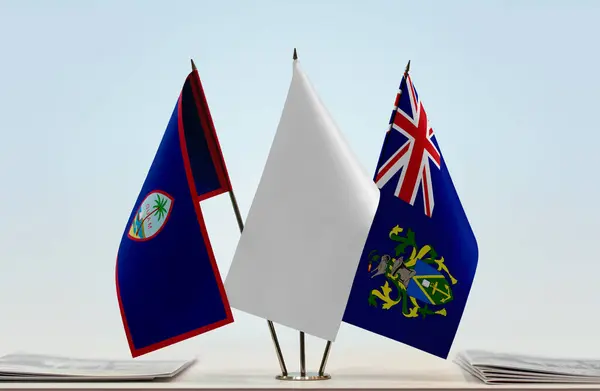 Guam Islas Pitcairn Banderas Blancas Stand Con Papeles — Foto de Stock