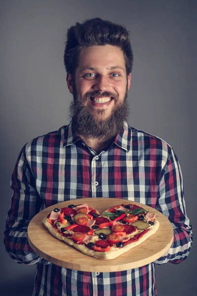 Happy Smiling Man Holding Home Made Heart Shaped Pizza — Stock Photo, Image