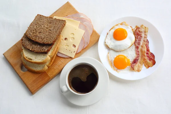 Breakfast Coffee Toasted Bread Eggs Bacon Cold Cuts Cheese Table — Stock Photo, Image